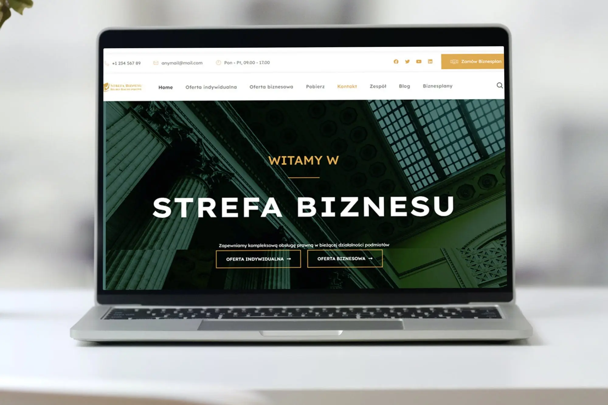 Strona strefabiznesu-zamosc.pl – realizacja na laptopie